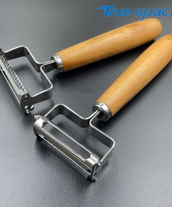 A stainless steel kitchen potato, carrot, vegetable and fruit peeler with a wooden handle