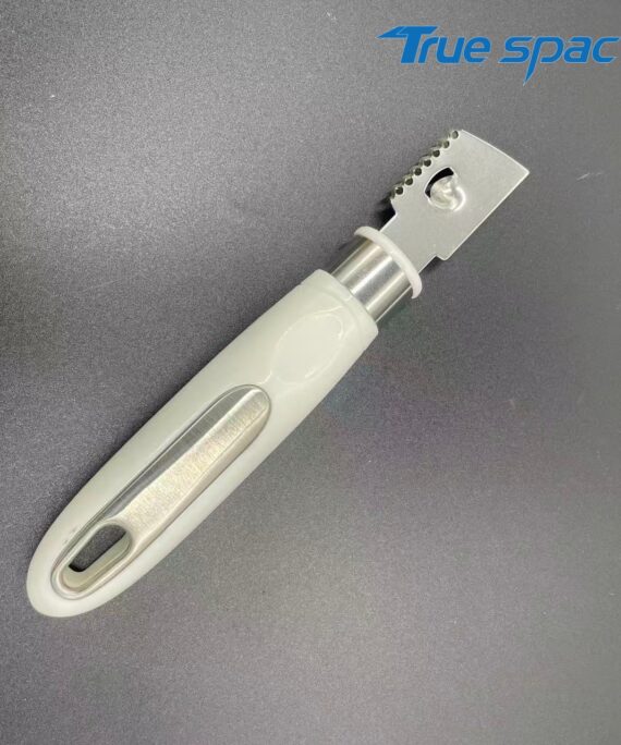 A stainless steel household kitchen grater is used for grilling lemon cheese