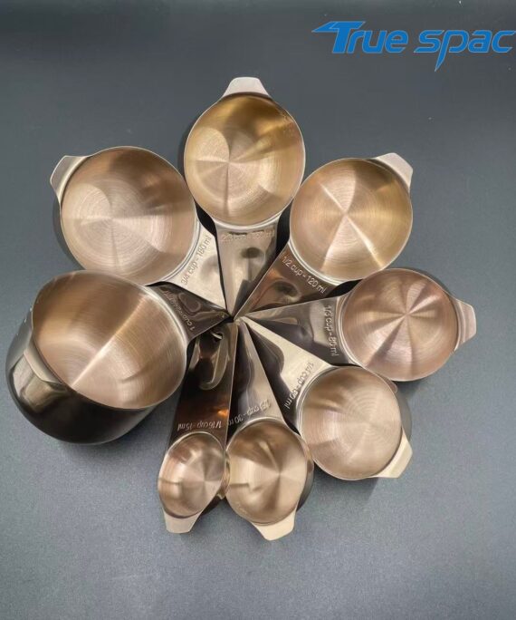A 7-piece set of eco-friendly rose gold-coated stainless steel measuring spoons and cups, suitable for kitchen coffee roasting