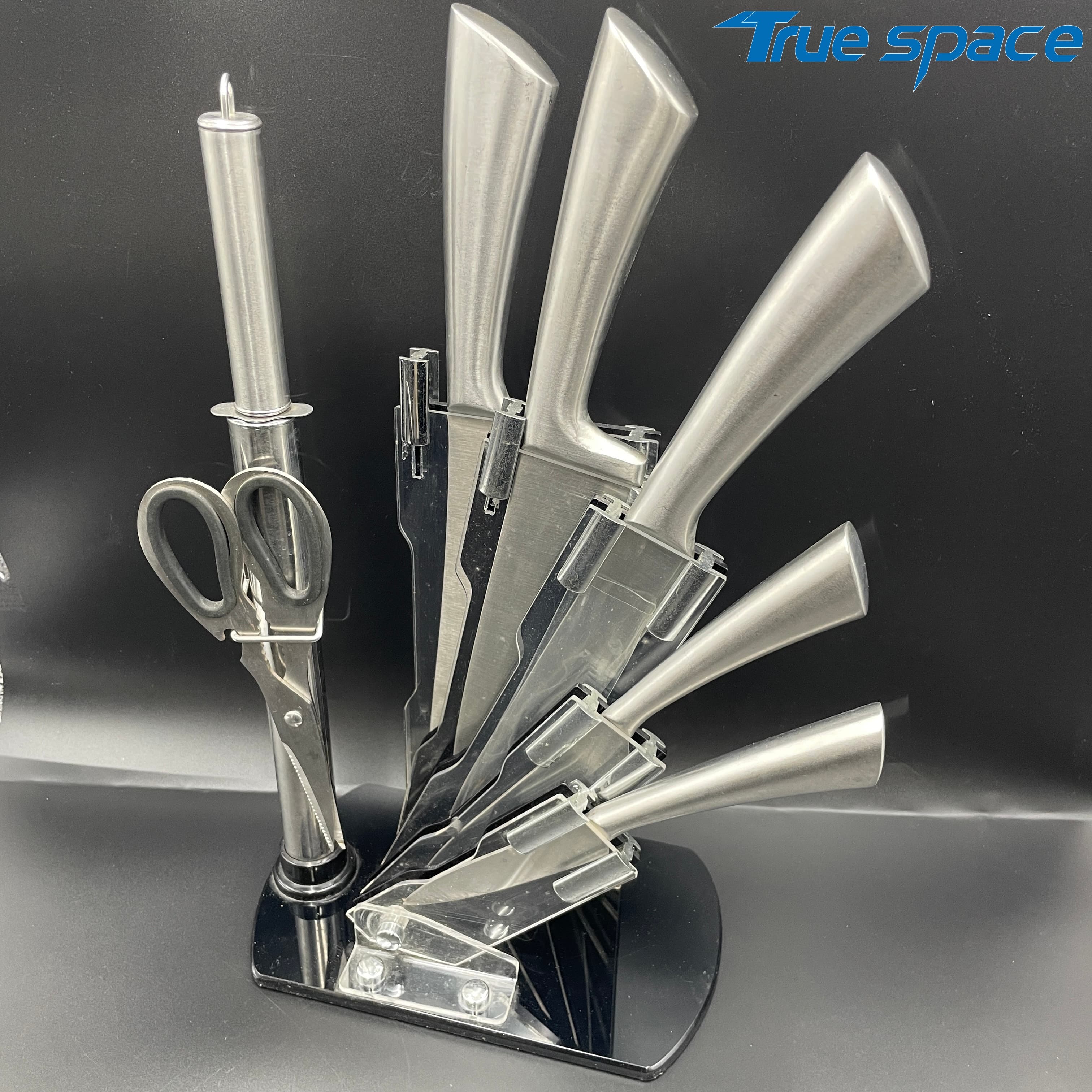 The Chef Uses a 8-piece Professional Kitchen Knife Set, Which Comes with an Acrylic Base and a Knife Sharpener